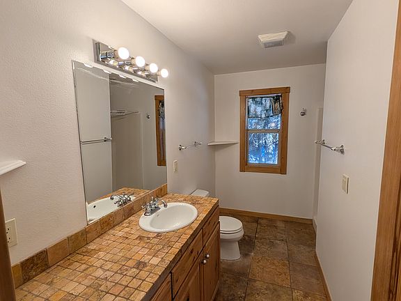 Large full sized bathroom with shower