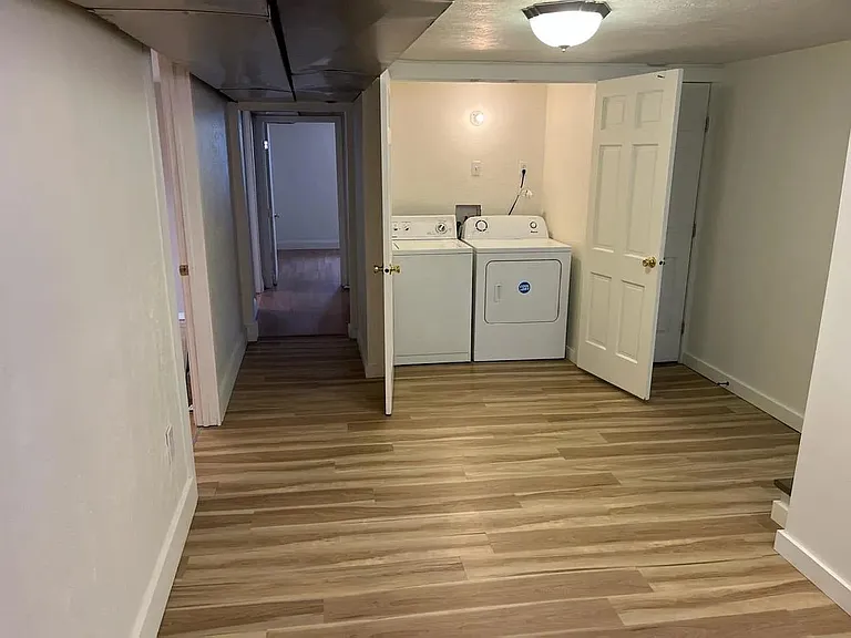 Laundry with washer and dryer included in home