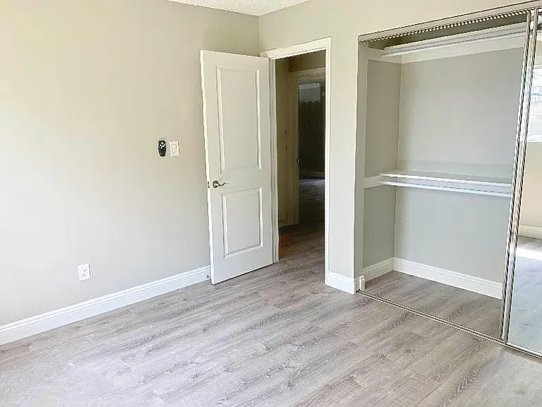 Bedroom w/updated fixtures and lighting