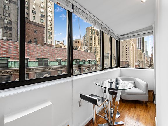 4th image of 150 W 58th St APT 13A