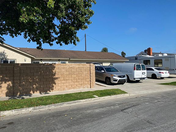 Large 2 car garage next to the private patio with high concrete walls to provide you with privacy