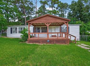 121 E Oak Shadows, Onalaska, TX 77360