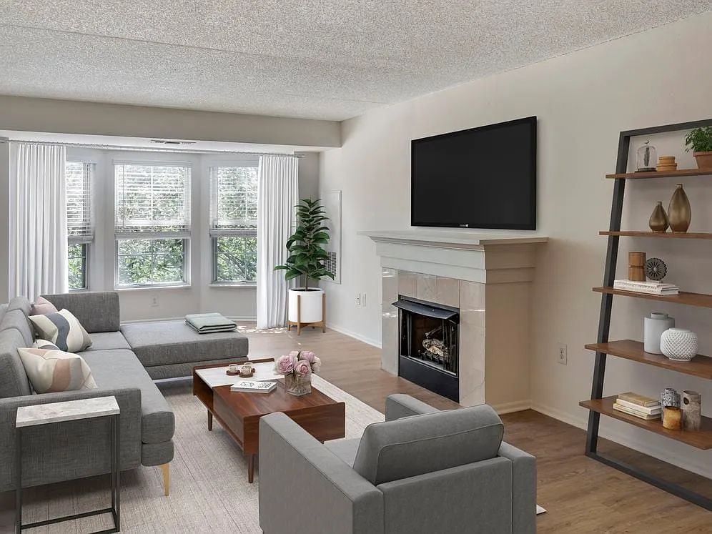 Renovated Package III living area with hard surface plank flooring - Avalon Cove