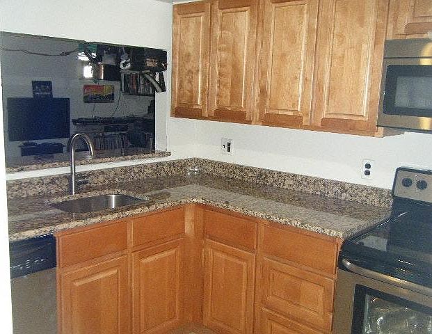 Kitchen / opening into living room