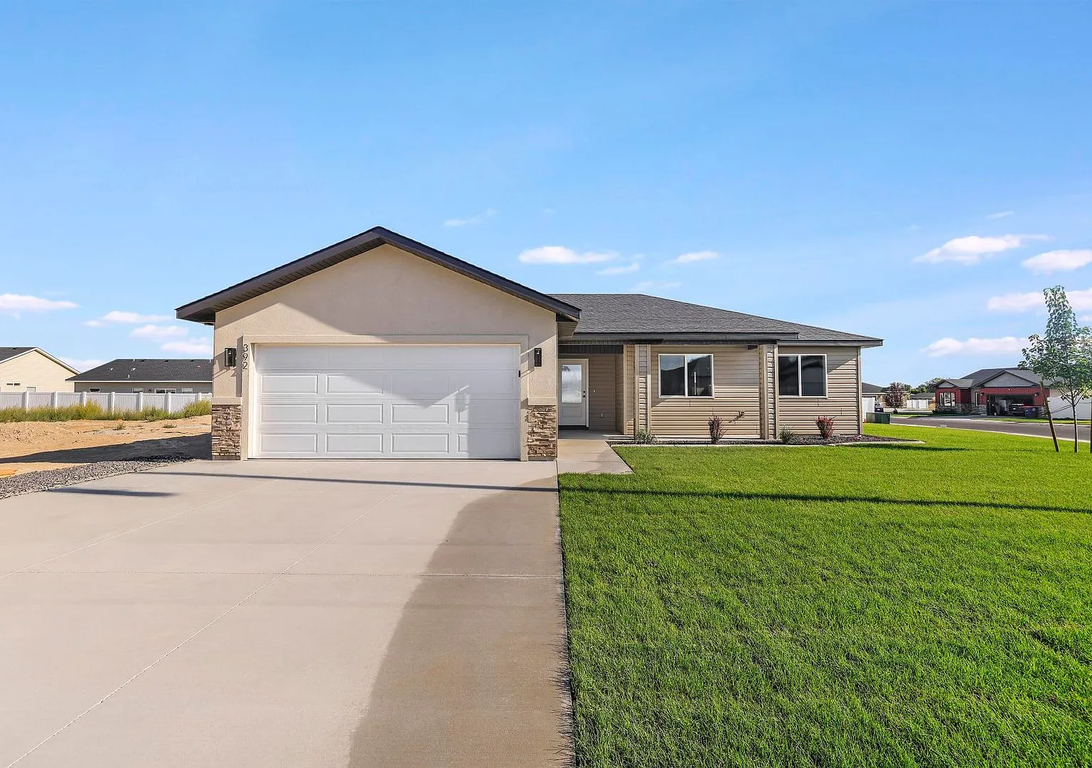 Spacious 4 bed/2 bath Rental with 2-Car Garage & Split Floor Plan — Photo 1