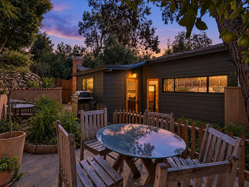 Exterior of cabin from private back patio. Furniture not included in rental.