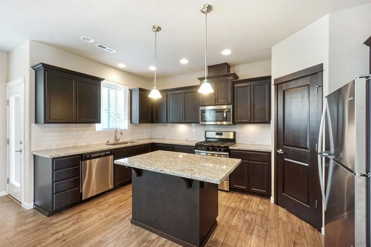 Granite counters subway tile backsplash - 9421 202nd St E