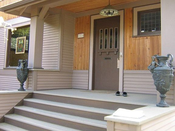 Comforting Porch leads to entry!