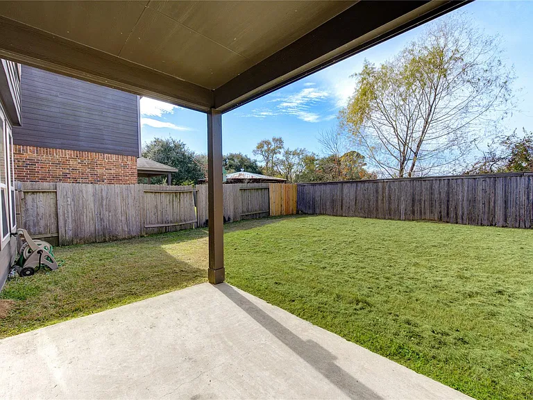 10907 Woodland Leaf Ln — Photo 30