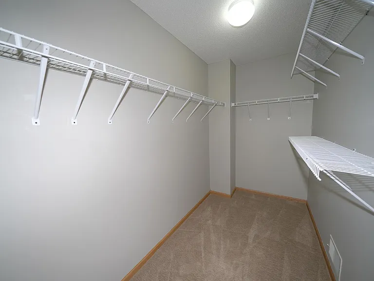 One of two large walk-in closets in this spacious home