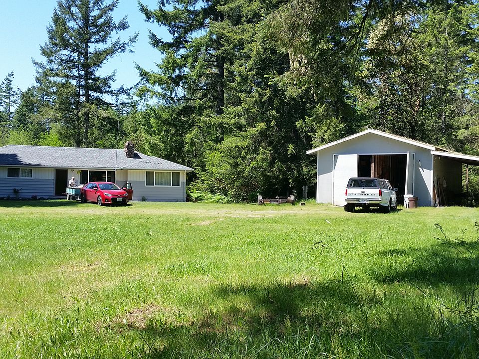 House and huge garage/carpor