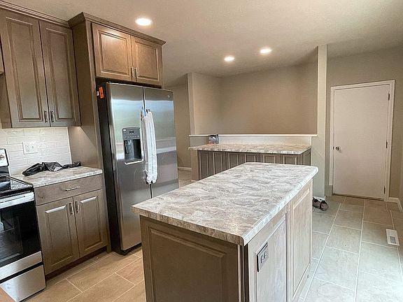 Kitchen with bar & island