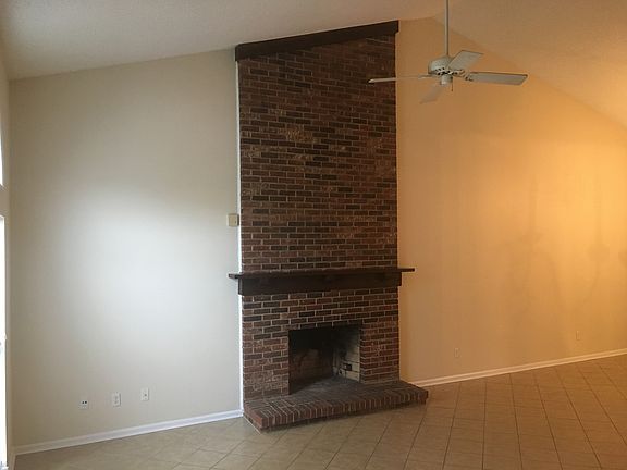 Wood burning fireplace on living room