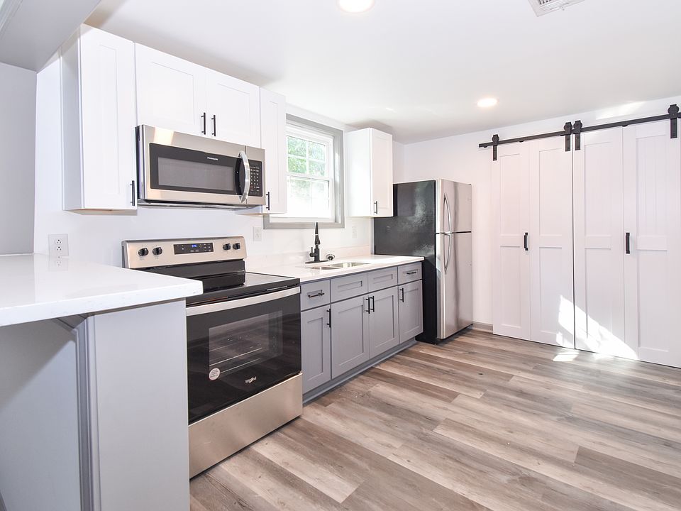 Bifold Barn Doors to Laundry Room