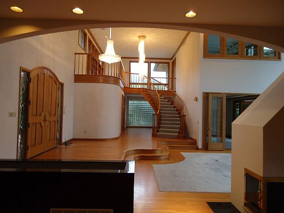 Formal entry & grand stair case to upper level master oasis