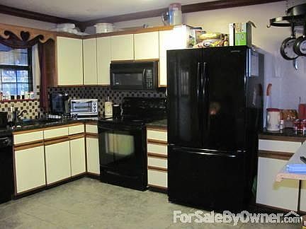 Kitchen
						:
						granite counters and custom ceramic backsplash