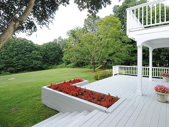 Large, sunny deck & yard