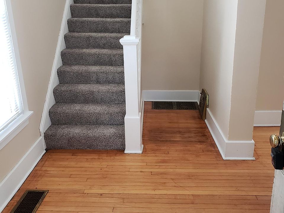 Large Entryway with Hardwood Floors