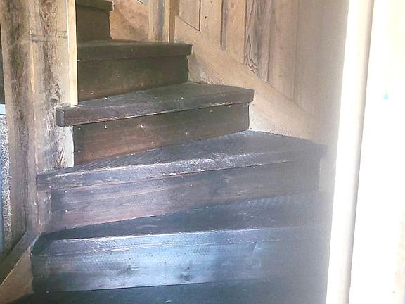 Stairs on both sides leading to the rest of the house