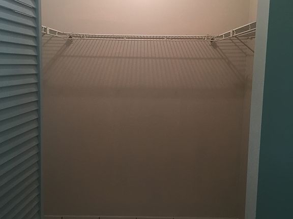 Walk in closet for room 1