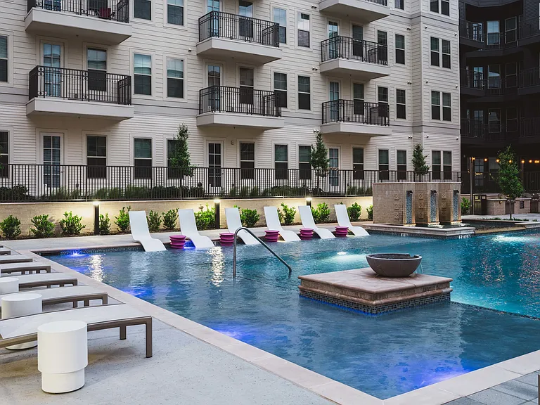 Pool with spacious sundeck and lounge seating