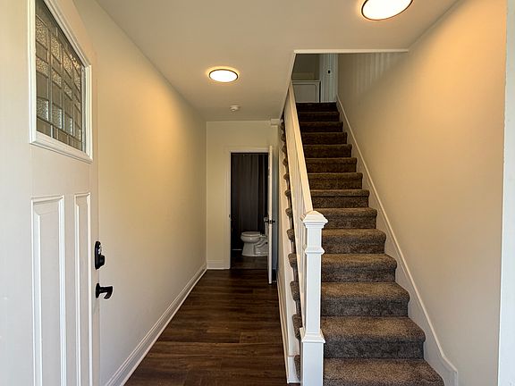 Entry and hallway to bathroom