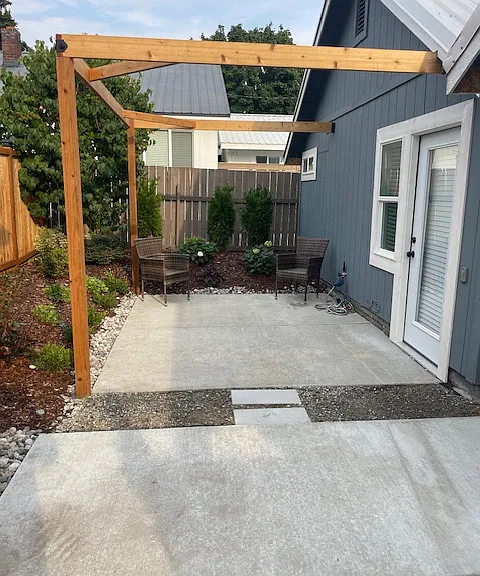 Large private back patio fully landscaped with watering system