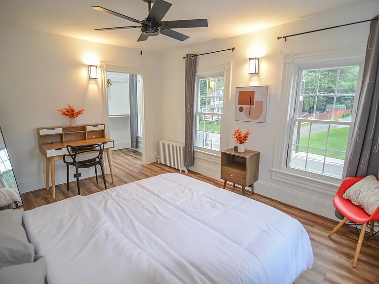 Bedroom with walk-in closet
