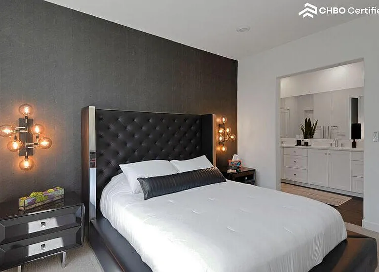 Primary bedroom with full, dual-sink ensuite