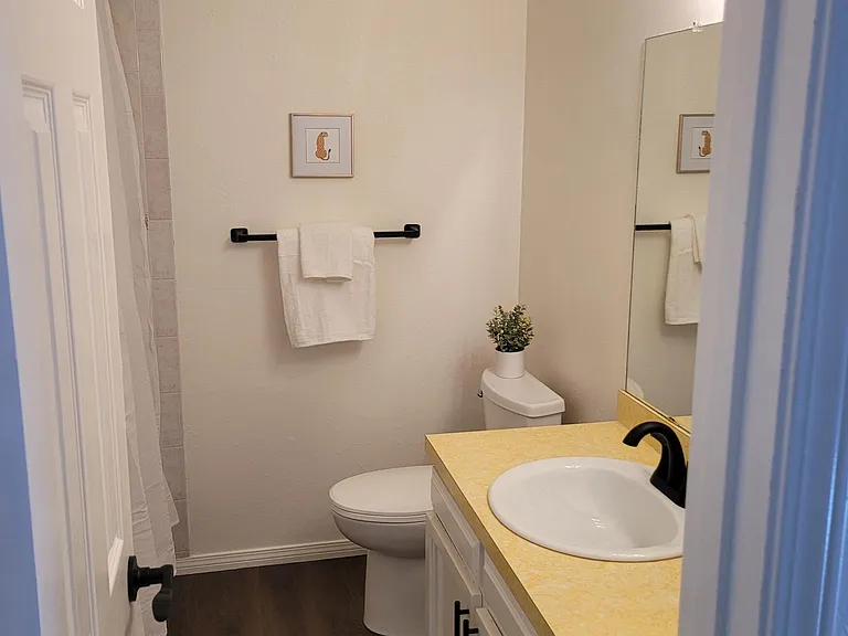 Secondary bathroom has tub/shower combo