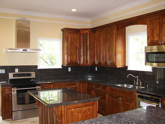 Huge Kitchen with Granite Countertops and SS Appliances