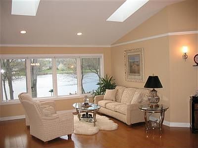 sitting area with windows to lake