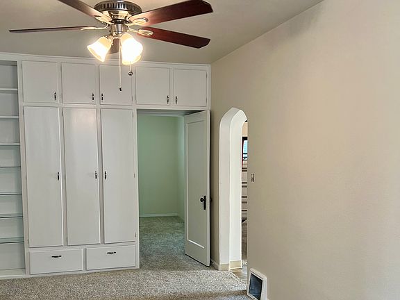 Built ins door to bedroom and kitchen