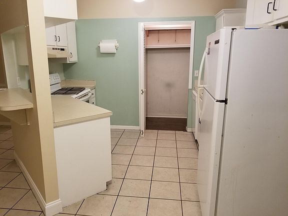 kitchen leading to pantry /laundry area