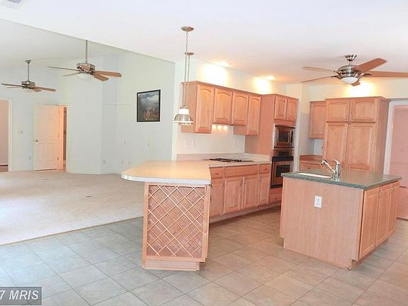 Breakfast Bar-Wine Rack-views to Family Rm, Din Rm