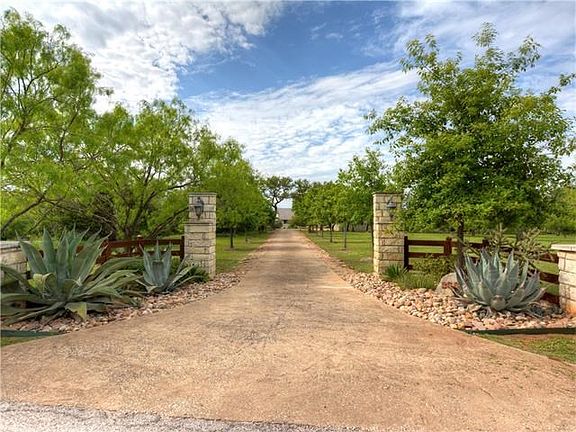 Welcome to your HILL COUNTRY HIDEAWAY! Enjoy the privacy this parcel provides or subdivide into 2 parcels - see agent for details!