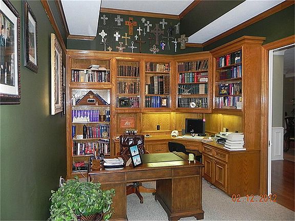 Look on the listing to see the size of the study in the front area of the home where you can also look out the front glass.