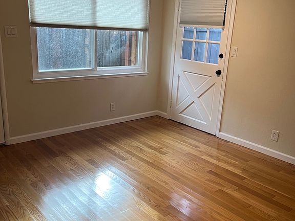 Living Room Area with door to outside deck - Deck is a great extension of the indoor living space.