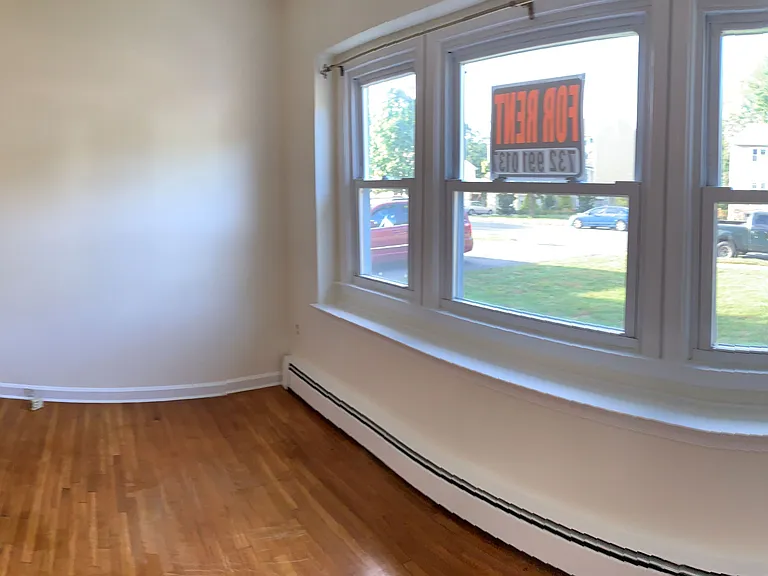 Panoramic view of the Living Room - 3 window pane, facing the front of the House.