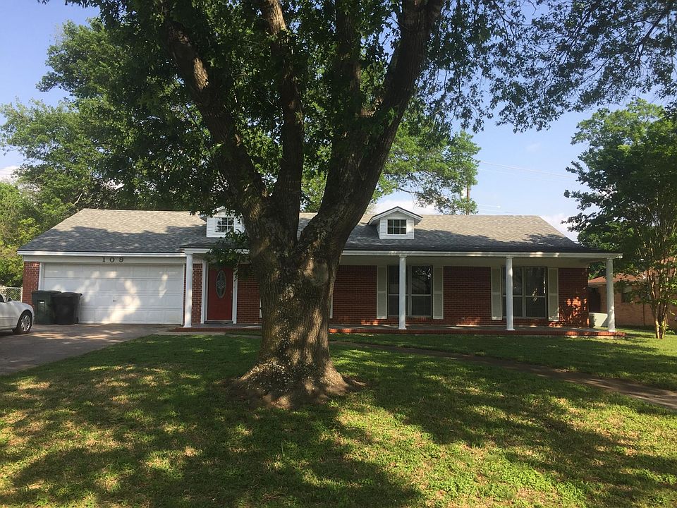 Large front porch with mature trees and quiet neighborhood 