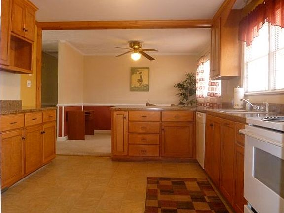 Kitchen w bar to den
