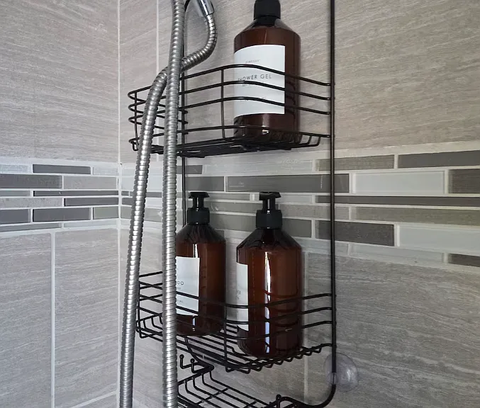 Full bathroom in upstairs hallway.