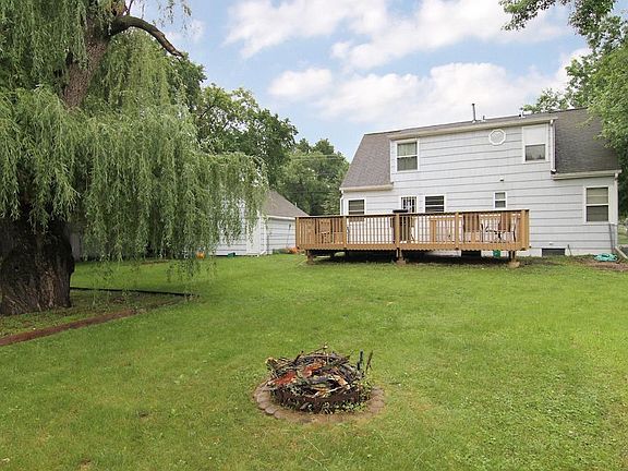 The back yard is fully fenced with 6-foot cedar privacy fencing on the east and northeast sides and chain link on the rest.