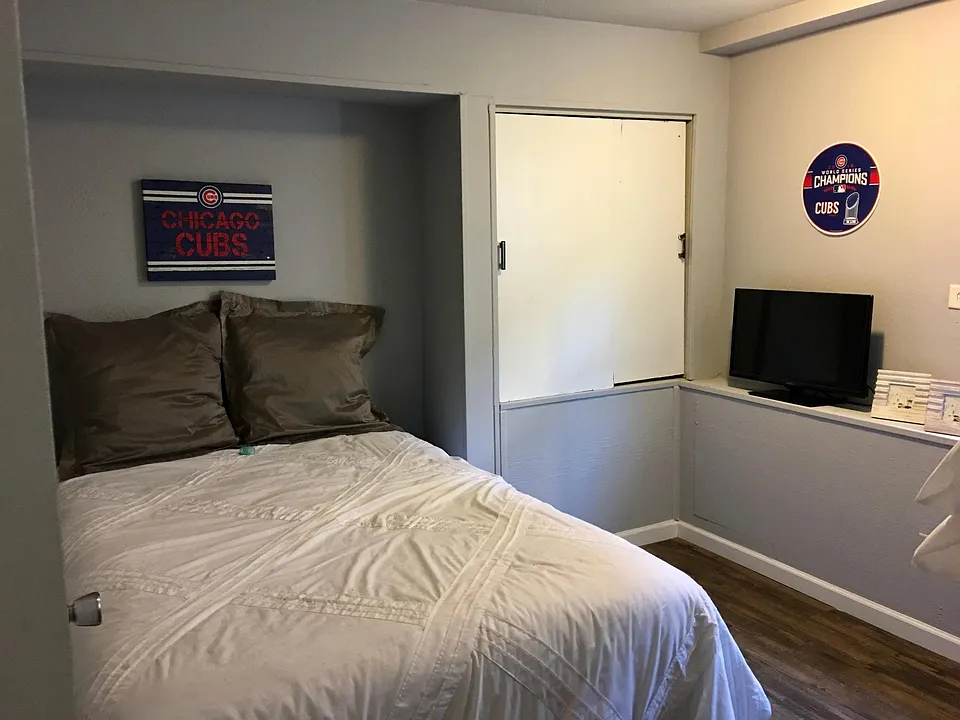 Den (full bed) small storage closet.