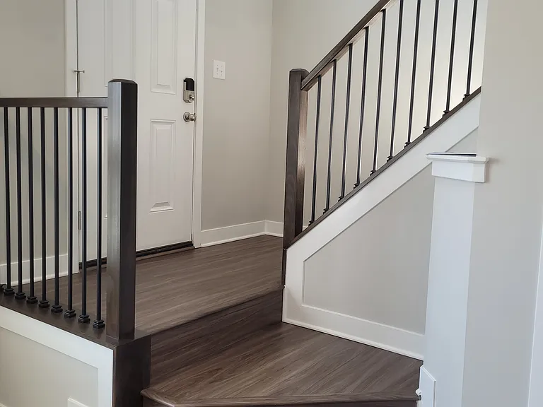 The entrance leads to a large all-purpose room on the first floor. It connects with the garage