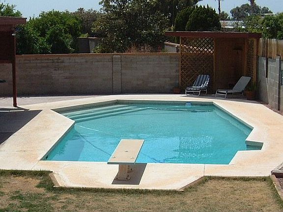 lots of covered patio, landscaped and pool