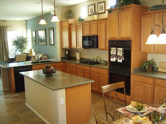Great kitchen with double ovens, microwave, and gas cook top.