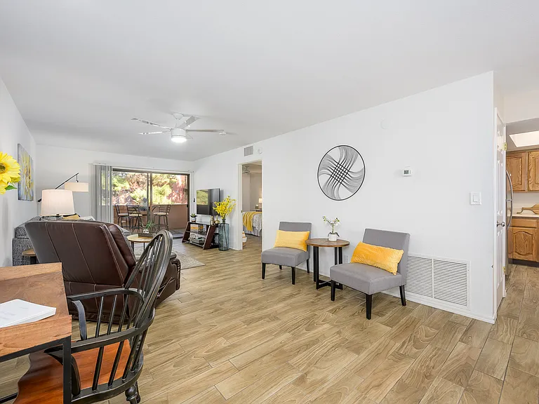 Extra seating close to living room and desk area.