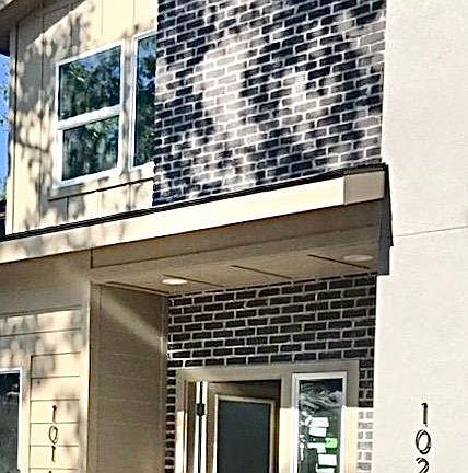 Exterior front, near completion of construction