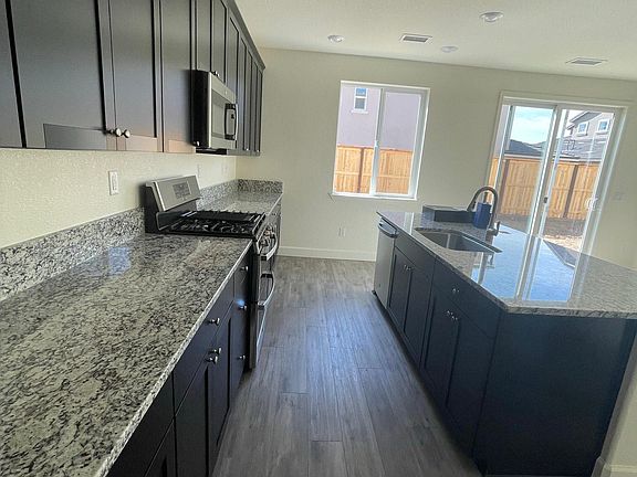 kitchen, gas stove, dishwasher, plenty of storage